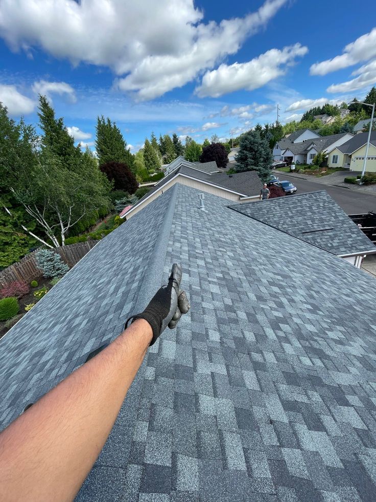 New shingle roof ridge in a Texas neighborhood